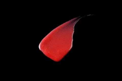 Lipgloss texture with black background Stock Photos