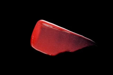 Lipgloss texture with black background Stock Photos