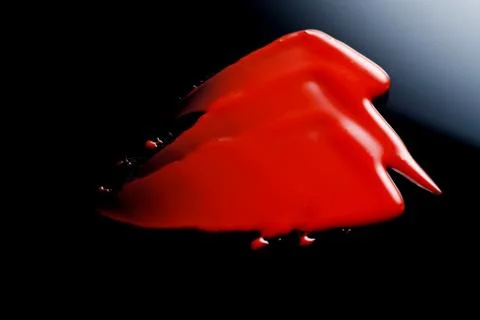 Lipgloss texture with black background Stock Photos