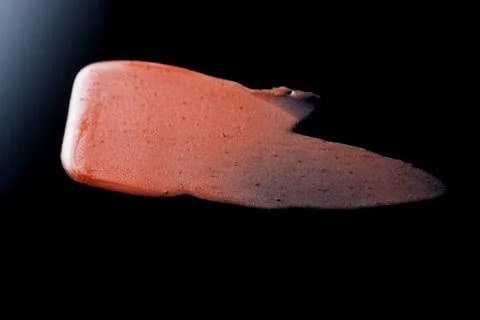 Lipgloss texture with black background Foto stock