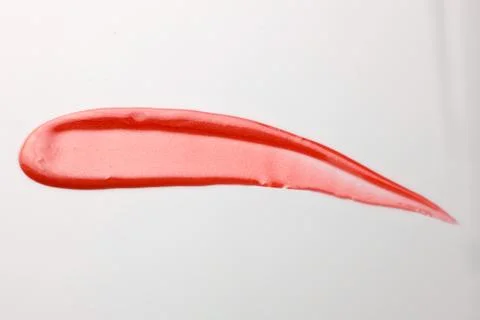 Lipgloss texture with white background Stock Photos