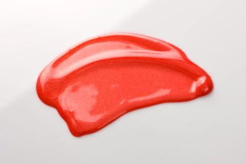 Lipgloss texture with white background Stock Photos