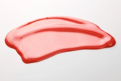 Lipgloss texture with white background Stock Photos