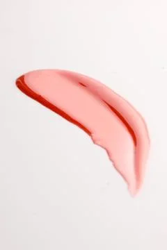 Lipgloss texture with white background Stock Photos