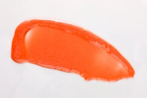 Lipgloss texture with white background Stock Photos