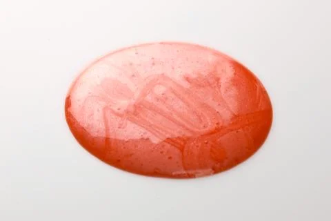 Lipgloss texture with white background Stock Photos