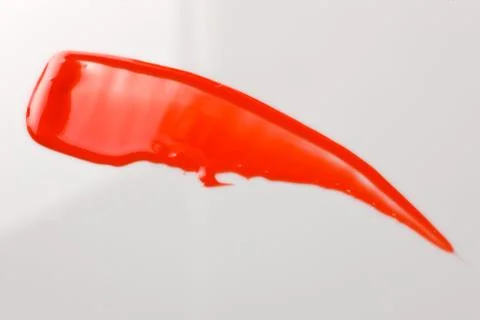 Lipgloss texture with white background Stock Photos