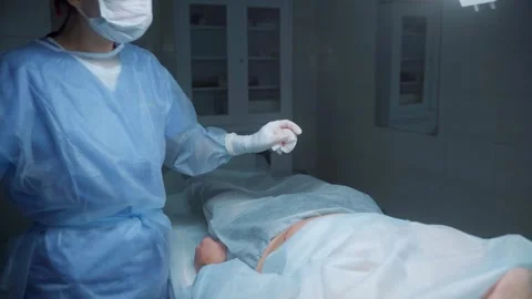 Liposuction procedure demonstrating techniques and care in a clinical setting Stock Footage 295864415