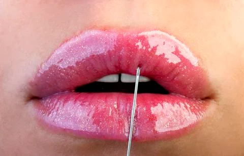 Lips and injection Stock Photos