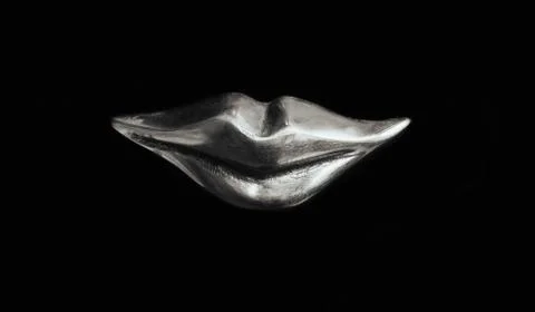 Lips of metal Stock Photos