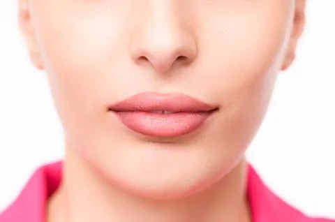 Lips with natural tone and subtle shimmer Stock Photos