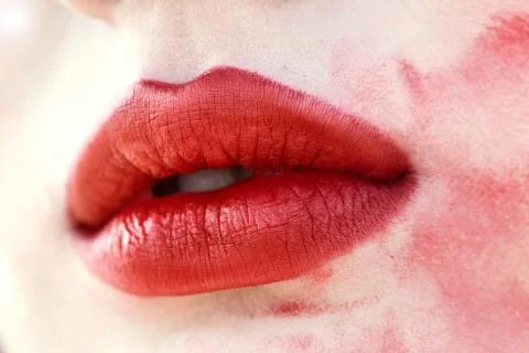 Lips With Smeared Lipsticks. Close-up Stock Photos