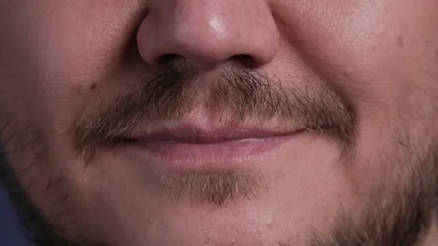 Lips of a smiling man. Stock Footage 232471588