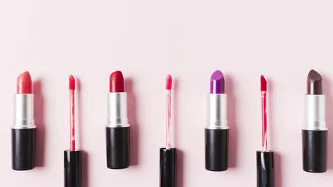 Lipstick brushes light surface Stock Photos