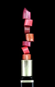 Lipstick stack on black background Stock Photos