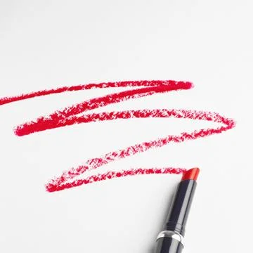 Lipstick zigzag pattern on white background Stock Photos