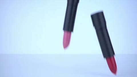 Lipsticks falling in slow motion. Stock Footage 95564996