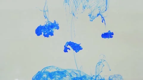 Liquid abstractions, the dissolution of blue paint in water. Stock Footage 200217315