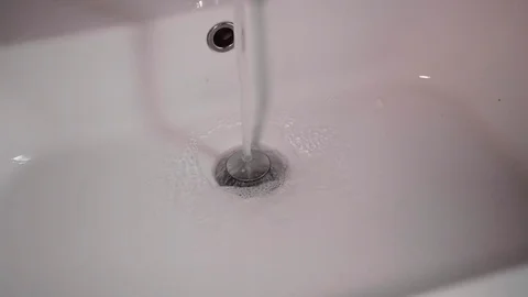 Liquid and foam on a white background - slow motion Stock Footage 124638783