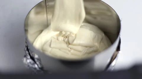 Liquid batter is poured into the baking dish Stock Footage 275146076