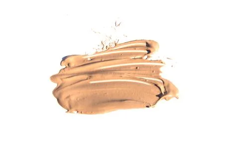 Liquid beige Foundation isolated on white background, make-up concept Stock Photos