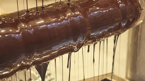 Liquid black chocolate during processing Stock Footage 123852497