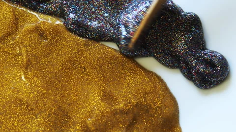 Liquid Brilliant Metallic Bronze Paint. Stock Footage 260409096