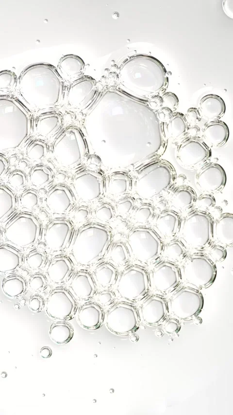 Liquid bubbles, fluid flow. Motion of molecule bubbles in a cosmetic serum,.. Stock Footage 305073372