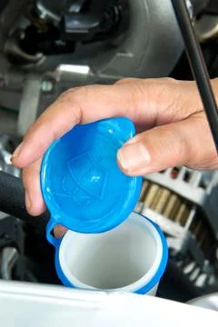 Liquid caps inside a car engine Stock Photos