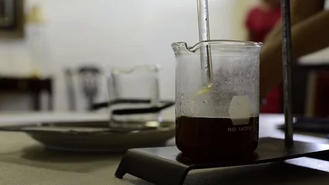 Liquid in Chemistry Beaker Stock Footage 94713199