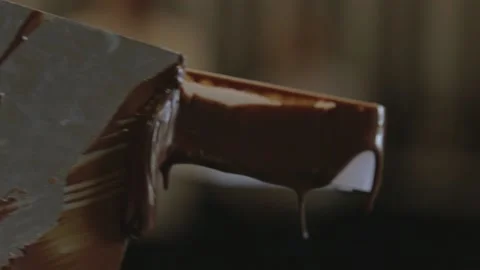 Liquid chocolate dripping Stock Footage 229718565