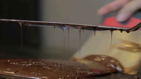 Liquid chocolate tempering Stock Footage 229718877
