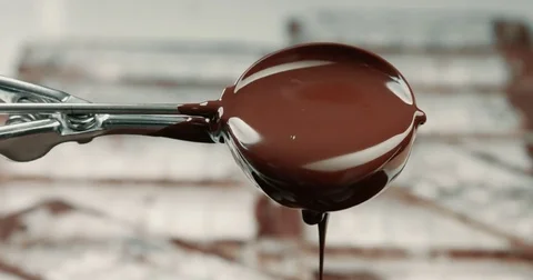 Liquid chocolate texture. Process of making a chocolate bars Stock Footage 78508102