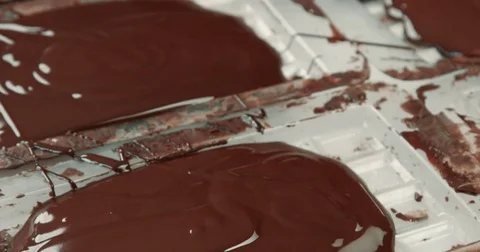 Liquid chocolate texture. Process of making a chocolate bars Stock Footage 78508194