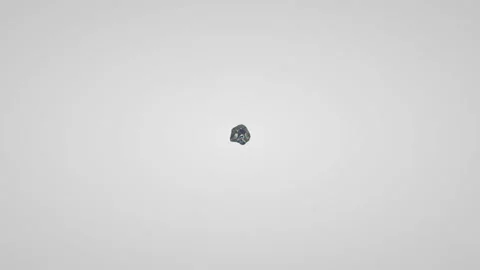 Liquid with dispersion of light spreads over a white background. Video stock 122533523