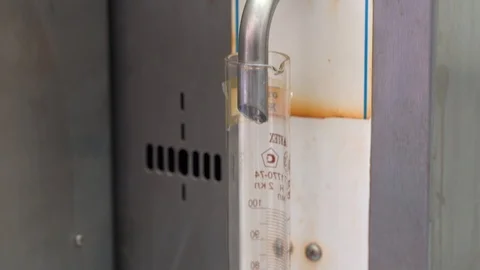 Liquid distillation process in a chemistry lab Stock Footage 123434847