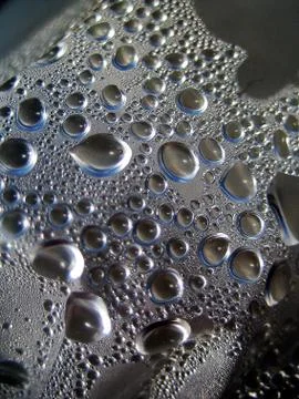 Liquid drops macro close up background wallpaper fine art prints products Stock Photos