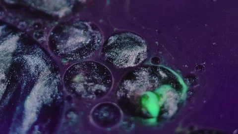 Liquid dye background pigment blend oil glitter Stock Footage 261721782