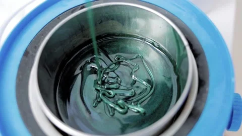 Liquid emerald wax, close-up. Removal of unwanted hair. Shugaring. Depilation. Stock Footage 239613518