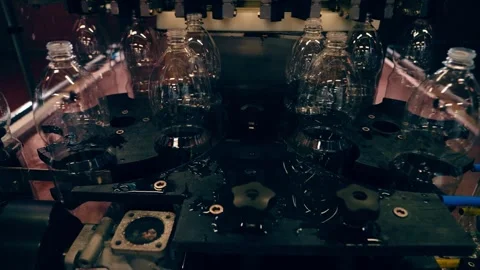 Liquid filling and bottle capping machine for industry. Stock Footage 244008601