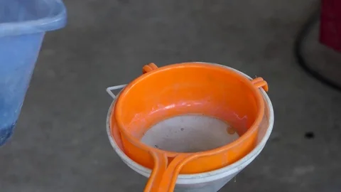 Liquid filtration by Filter. Stock-Footage 80456802