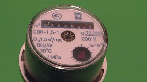 Liquid flow meter on a green background Stock Footage 978870