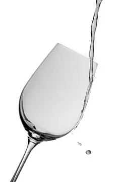 The liquid flows into the glass Stock Photos