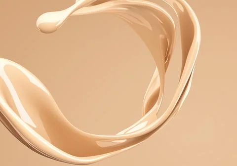 Liquid foundation elements. Splashing beige liquid, flow of creamy texture Foto stock