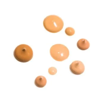 Liquid Foundation om white Stock Photos