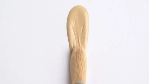 Liquid foundation or bb cream beige color smudge, vertikal swatch. A smear .. Stock Footage 265238262