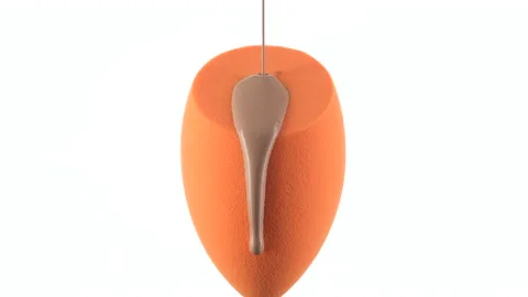 Liquid foundation pour on yellow make up blender sponge Video stock 138371601