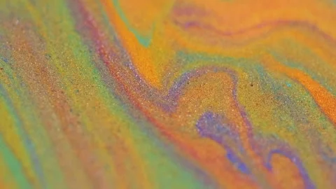 Liquid glitter mix marble paint orange purple ink Stock Footage 281811552
