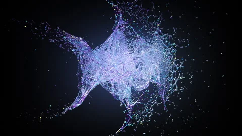 Liquid with glitter particles drops colliding with splash on black background Stock Footage 262978866