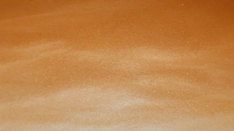 Liquid gold abstract smooth waves flowing from left to right and resembles a Stock Footage 103256086